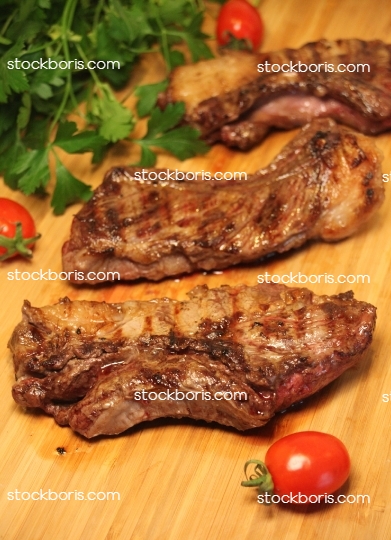 Beef steaks. Grilled barbecue meat.