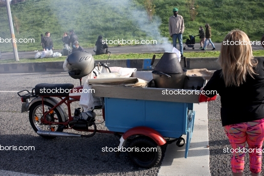 Bike with a chestnuts roaster.