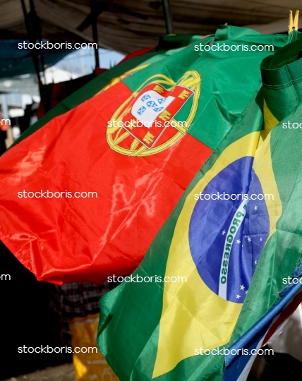 Brazilian and Portuguese flags together.