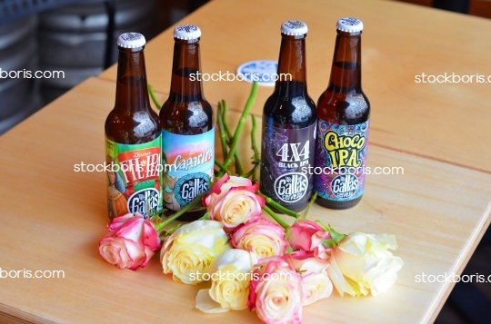 Craft beer bottles with flowers during international women\'s day.