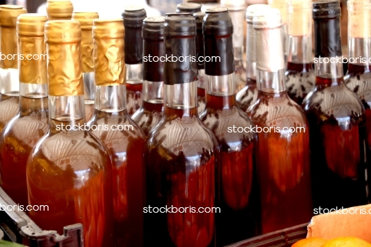 Homemage licquor bottles at a market. Craft gin and distilled drinks.