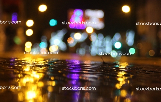 Nightlife, disco, rain, night lights.